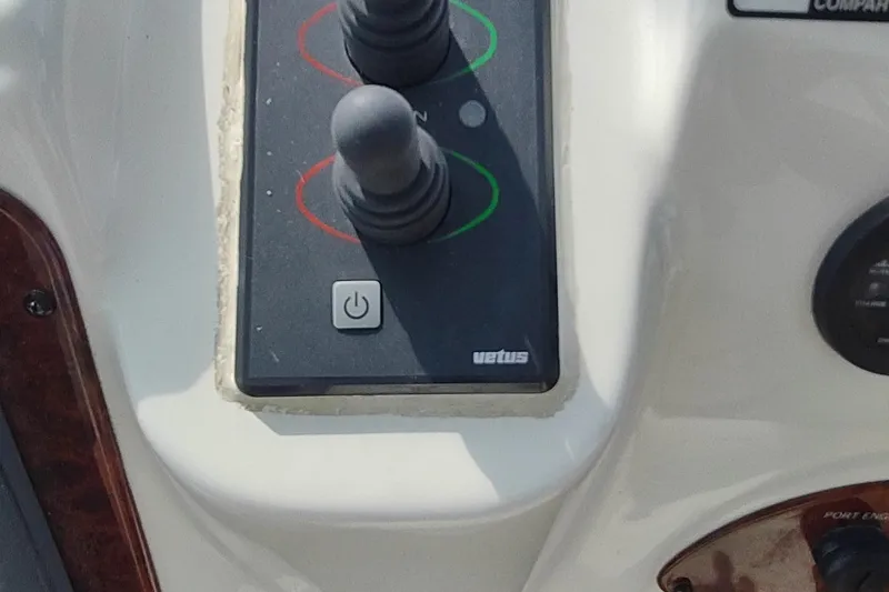 Slide: The Image of Control panel of a 2001 Maxum 4600 SCB boat with Vetus joystick controls. - 20