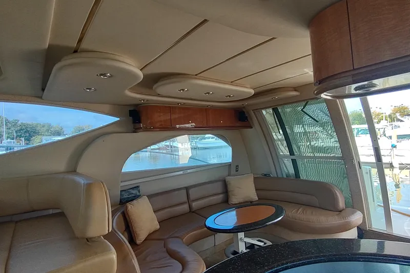 Slide: The Image of Luxurious interior of 2001 Maxum 4600 SCB yacht with leather seating and elegant design. - 25