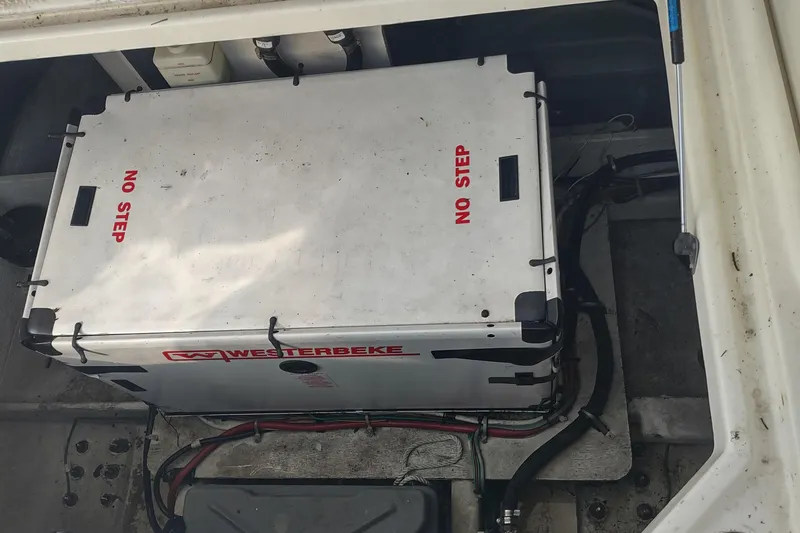 Slide: The Image of Engine compartment of 2001 Maxum 4600 SCB with Westerbeke generator, labeled "No Step." - 45