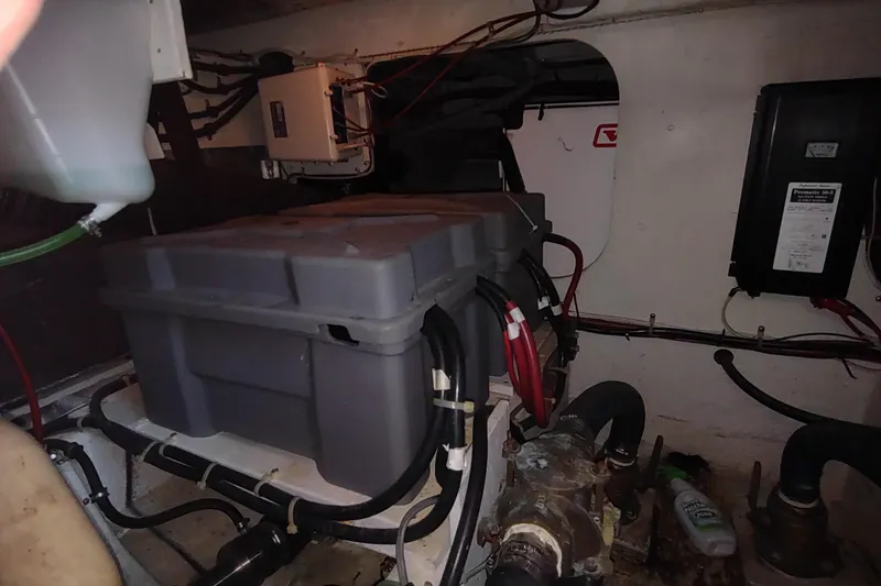 Slide: The Image of Engine room of 2001 Maxum 4600 SCB yacht with visible equipment and wiring. - 48