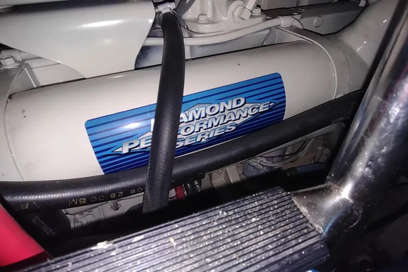 Slide: The Image of Engine compartment of a 2001 Maxum 4600 SCB with Diamond Performance Series label. - 55