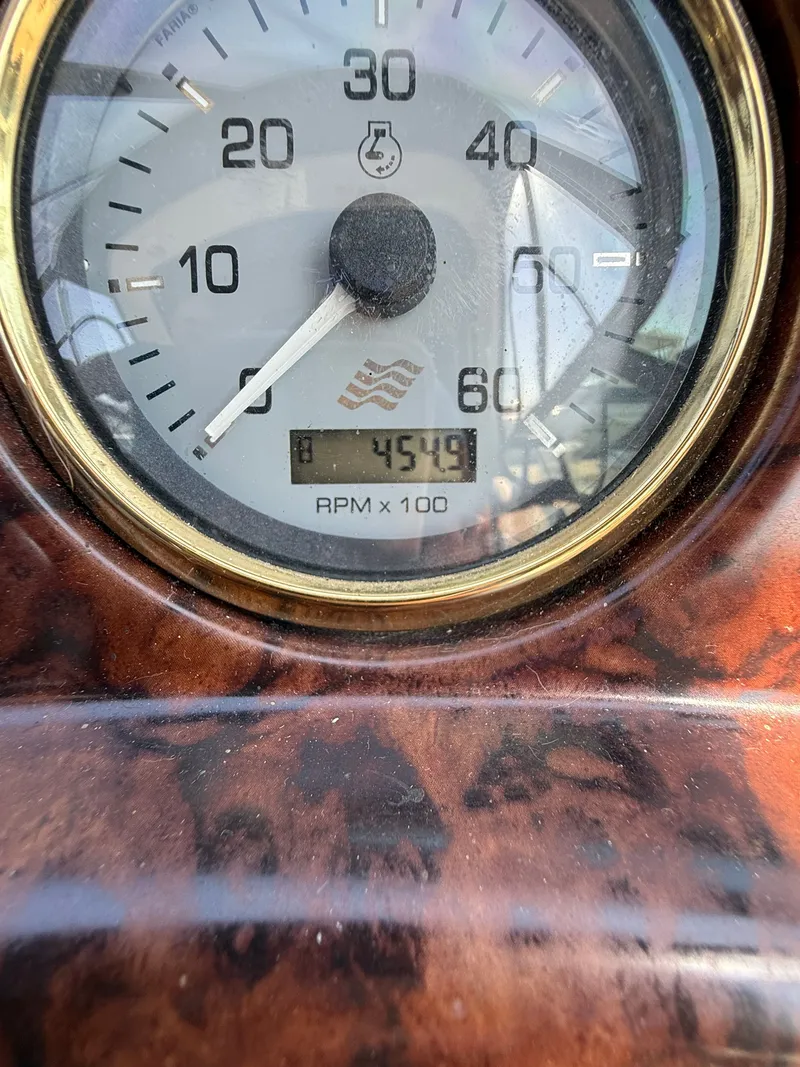 Slide: The Image of Close-up of a 2004 Four 328 Vista tachometer showing 4549 RPM. - 24