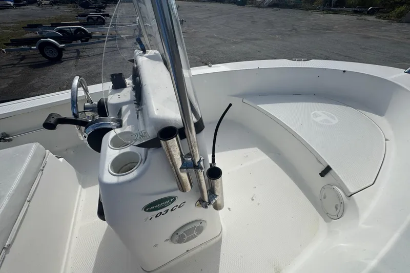 Slide: The Image of 2007 Trophy 1703 Center Console boat interior with steering wheel and seating area. - 11