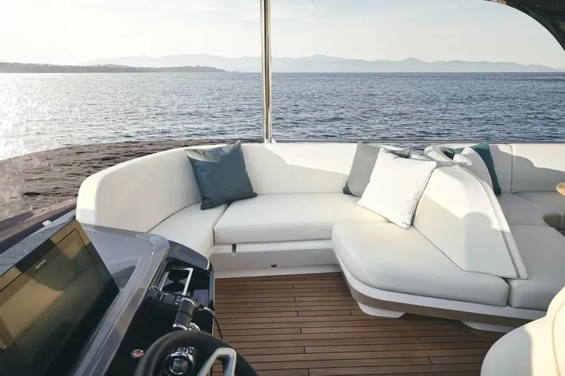 Slide: The Image of Luxurious 2026 Princess F65 yacht with elegant seating and scenic ocean view. - 12