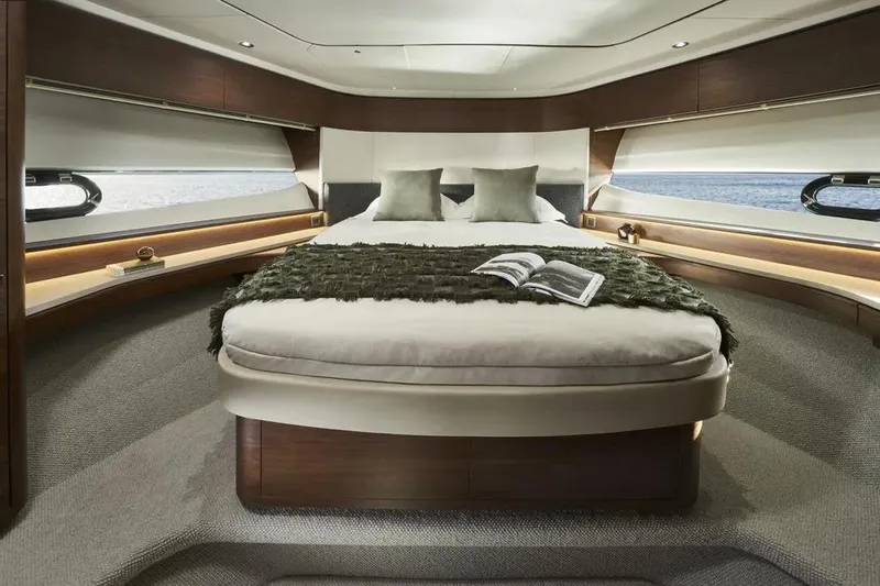 Slide: The Image of Luxurious 2026 Princess F65 yacht bedroom with elegant decor and ocean view. - 17