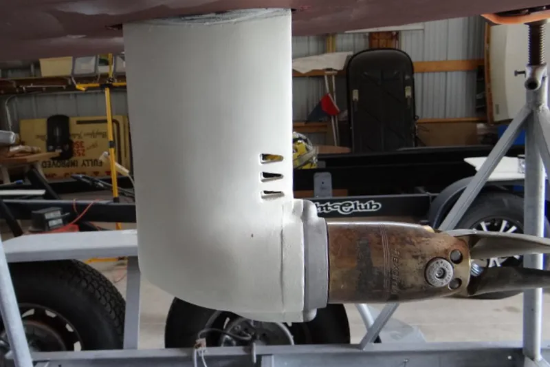 Slide: The Image of Close-up of a 2012 Morris Yachts M29 sailboat's rudder and propeller in a workshop. - 11