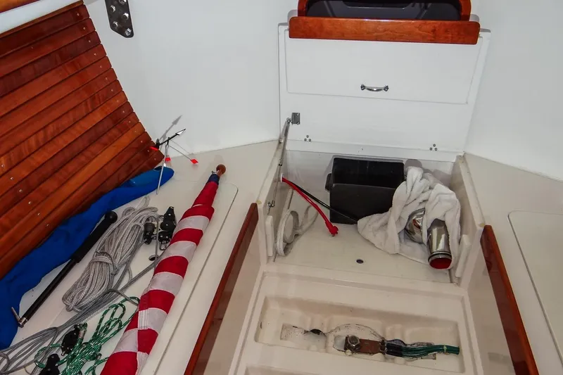 Slide: The Image of Interior of 2012 Morris Yachts M29 sailboat with storage compartments and sailing gear. - 13