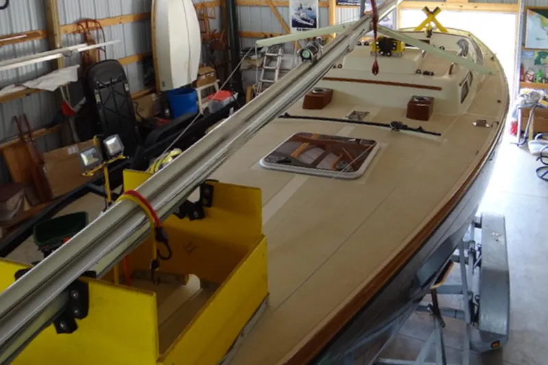 Slide: The Image of 2012 Morris Yachts M29 sailboat in a workshop, showcasing deck and rigging details. - 8