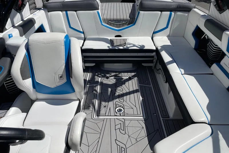 Slide: The Image of 2016 Nautique Super Air Nautique G21 interior with sleek seating and modern design. - 12