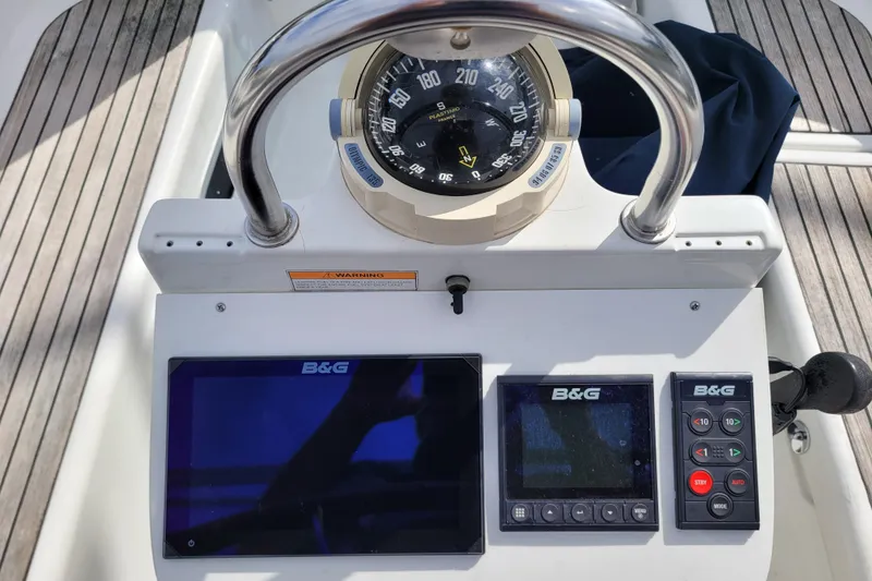 Slide: The Image of Cockpit of 2002 Beneteau Oceanis 311 with B&G navigation instruments and compass. - 11