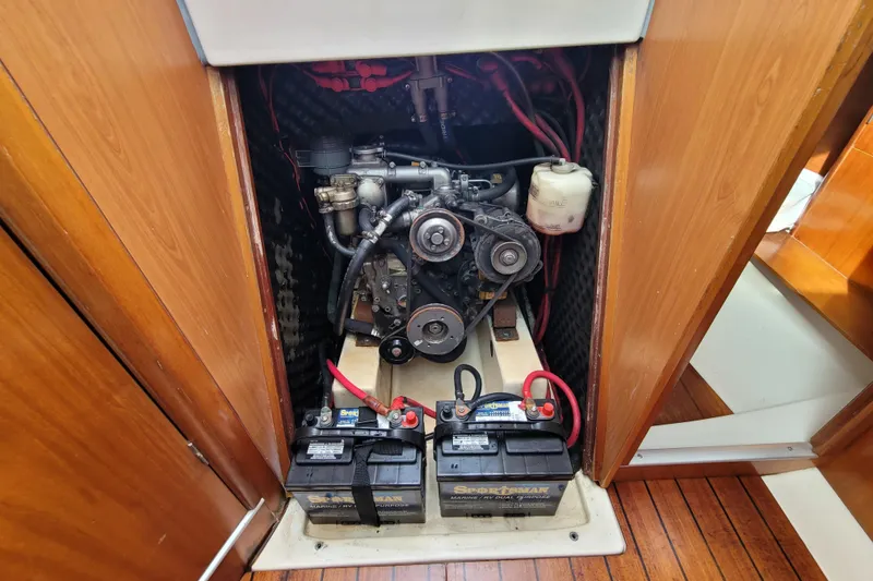 Slide: The Image of Engine compartment of a 2002 Beneteau Oceanis 311 sailboat with visible batteries. - 37