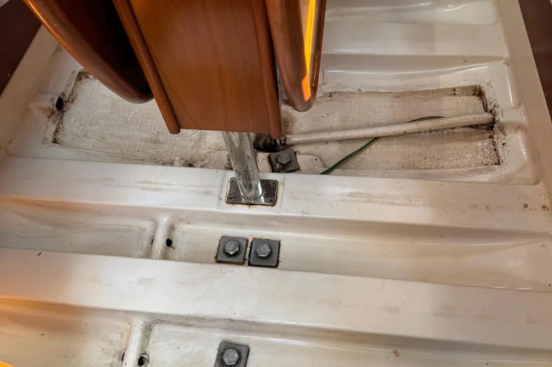 Slide: The Image of Interior view of 2002 Beneteau Oceanis 311 sailboat, showing floor and structural details. - 42