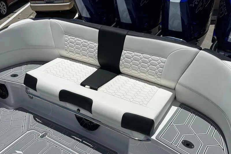 Slide: The Image of Luxurious seating on 2025 Nor-Tech 390 Sport boat with stylish hexagonal pattern. - 27