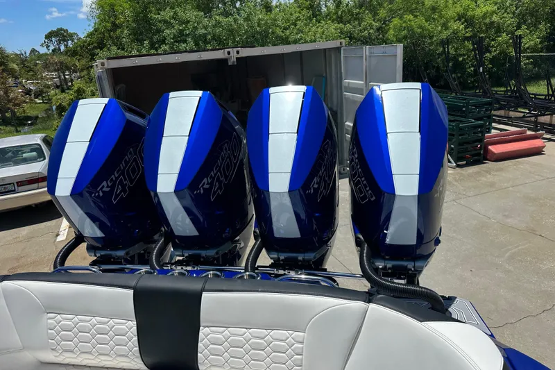 Slide: The Image of 2025 Nor-Tech 390 Sport with four blue Racing 400R outboard engines. - 28