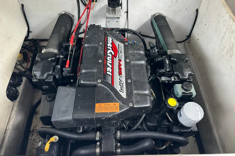 Slide: The Image of Engine compartment of a 1999 Envision 3200 Intruder with MerCruiser 502 MAG MPI. - 31