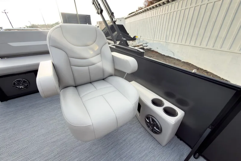 Slide: The Image of Luxurious seating on 2026 Godfrey Sweetwater Xperience 22' Tritoon with cup holders and speaker. - 20