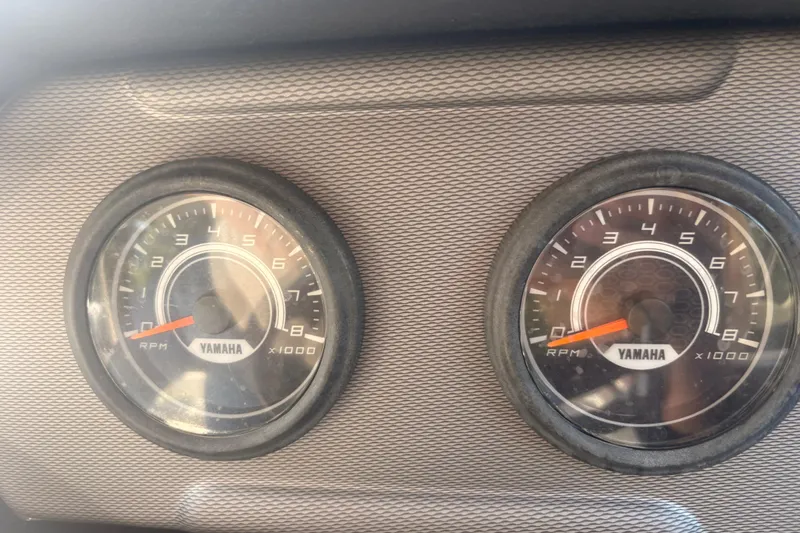 Slide: The Image of Close-up of 2018 Yamaha SX210 boat tachometers displaying RPM readings. - 21
