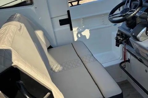 Slide: The Image of 2025 Navan C30 interior with beige seating and modern steering console. - 26