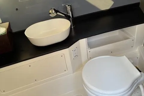 Slide: The Image of Modern bathroom in 2025 Navan C30 with sleek sink and toilet design. - 29