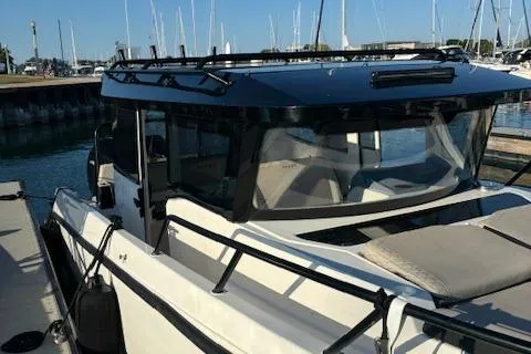 Slide: The Image of 2025 Navan C30 boat docked at marina, featuring sleek design and modern amenities. - 3