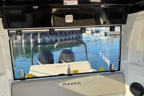 Slide: The Image of Navan C30 2025 boat interior with rear view of twin engines at dock. - 35