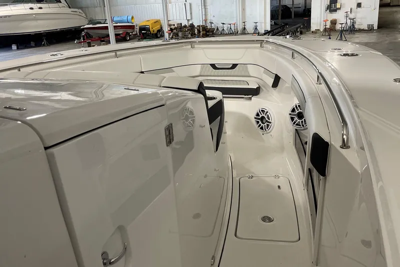 Slide: The Image of 2025 Blackfin 400 CC boat interior with sleek white design and modern features. - 20