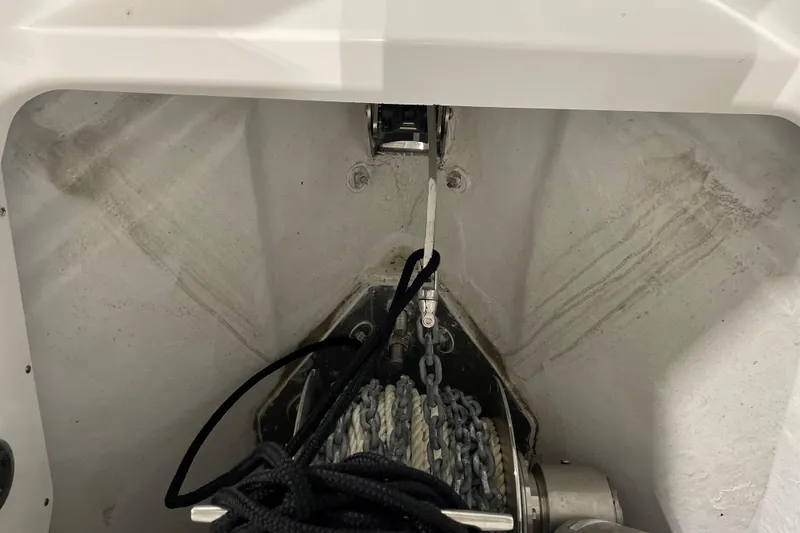 Slide: The Image of Anchor compartment of 2025 Blackfin 400 CC boat with ropes and chains. - 25