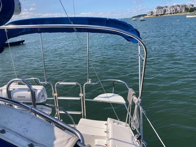 Slide: The Image of Sailboat deck view of 1995 Catalina 30 Mk III on calm water. - 4