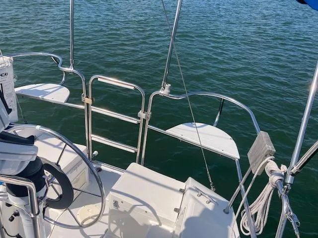 Slide: The Image of Sailboat deck view of 1995 Catalina 30 Mk III on water. - 5