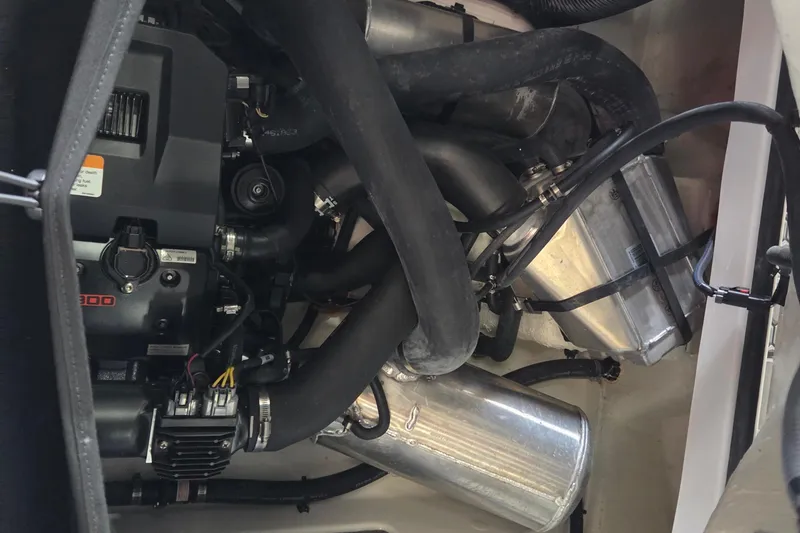 Slide: The Image of 2023 Scarab 165 H.O. Platinum boat in indoor storage facility. - 13