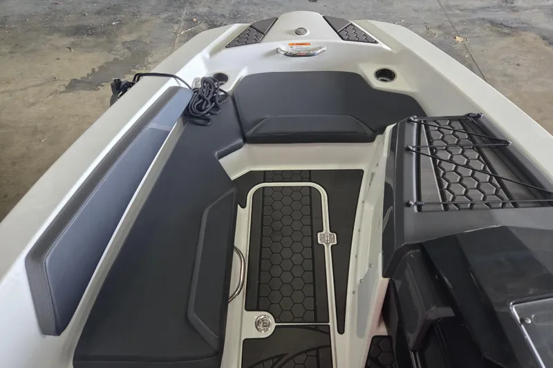 Slide: The Image of 2023 Scarab 165 H.O. Platinum boat interior with steering wheel and seating. - 3