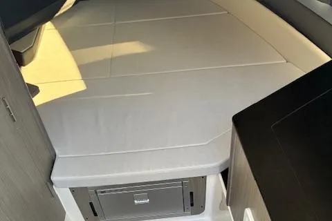 Slide: The Image of Interior cabin of 2025 Navan C30 boat with modern design and storage. - 28