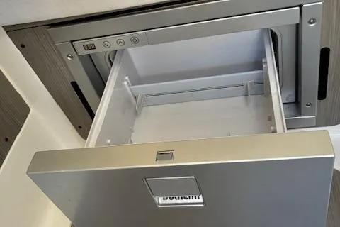 Slide: The Image of Open drawer in a 2025 Navan C30, showcasing modern interior design. - 30