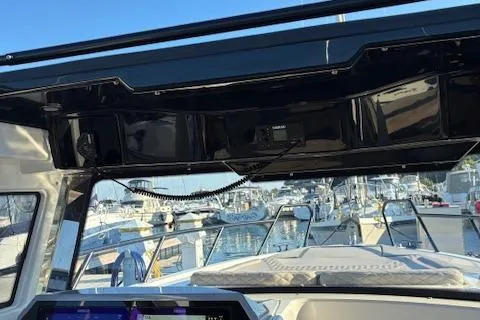 Slide: The Image of 2025 Navan C30 boat interior with marina view, showcasing modern design and advanced navigation equipment. - 33