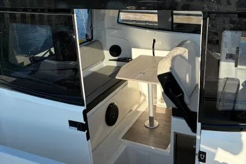 Slide: The Image of Interior of 2025 Navan C30 boat with seating and table. - 4