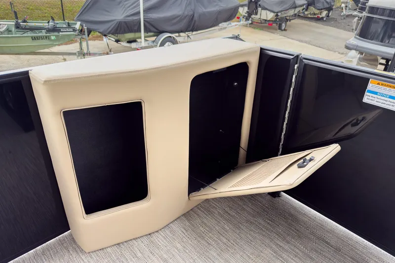 Slide: The Image of Interior storage compartment of 2026 Godfrey Sweetwater Xperience 22' Tritoon boat. - 18