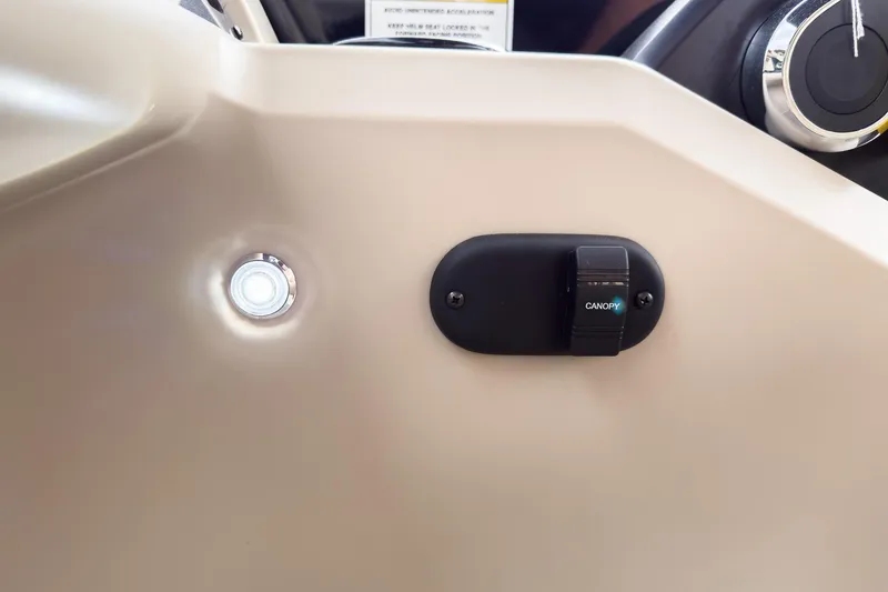 Slide: The Image of Control panel of 2026 Godfrey Sweetwater Xperience 22' Tritoon, featuring canopy switch and light. - 25