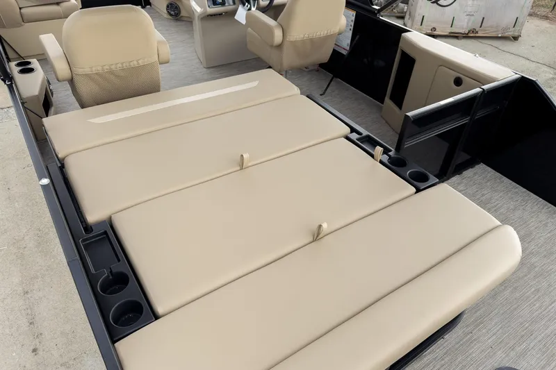 Slide: The Image of 2026 Godfrey Sweetwater Xperience 22' Tritoon with beige flip lounge seating. - 14