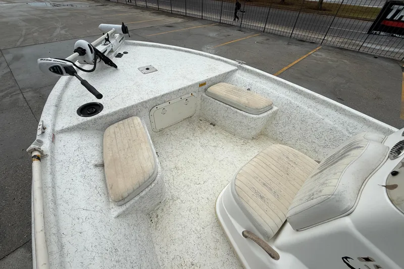 Slide: The Image of 2008 Mako 191 Inshore boat interior with seating and trolling motor. - 10