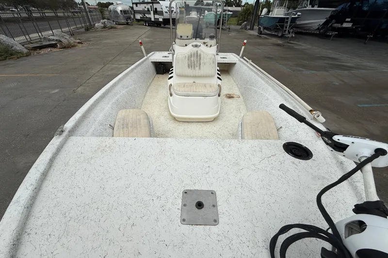 Slide: The Image of 2008 Mako 191 Inshore boat with center console, parked in a lot. - 11