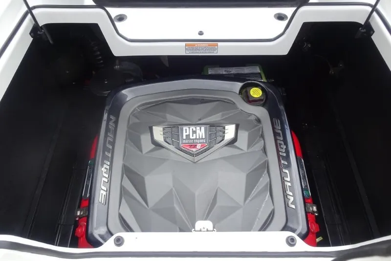 Slide: The Image of Engine compartment of 2021 Nautique Super Air Nautique G23 boat. - 23