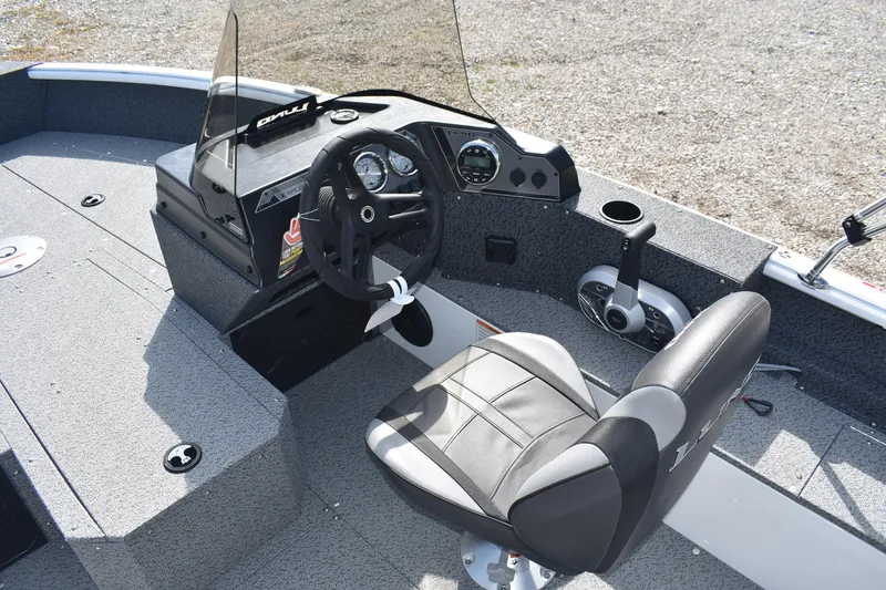 Slide: The Image of 2026 Lund 1800 Explorer SS capacity label, 6 persons or 925 lbs, 115 HP motor. - 10