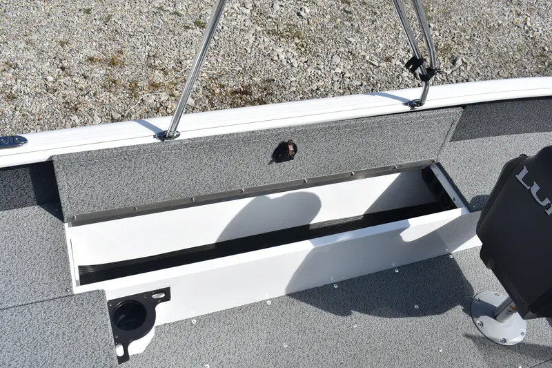 Slide: The Image of 2026 Lund 1800 Explorer SS boat interior with spacious deck and steering console. - 14