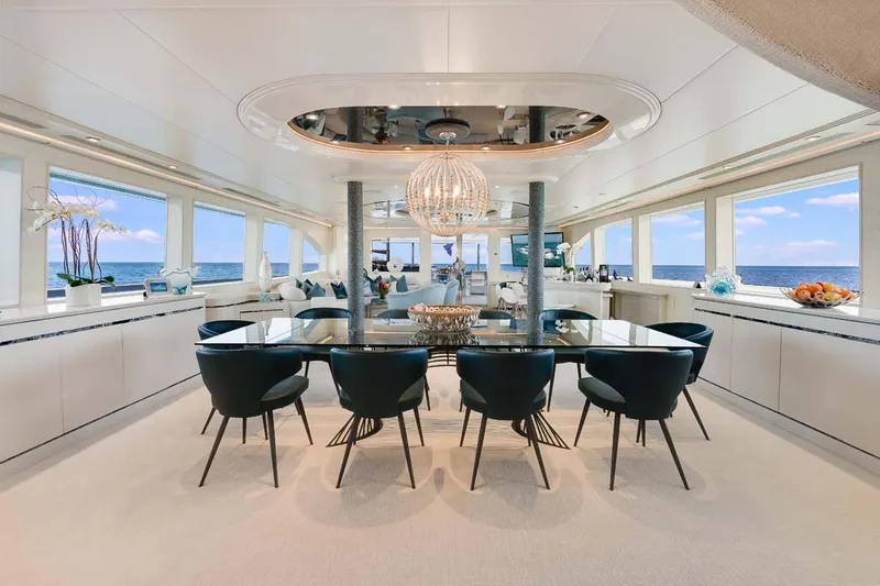 Slide: The Image of Luxurious 2001 Westship Skylounge interior with elegant dining area and ocean views. - 12