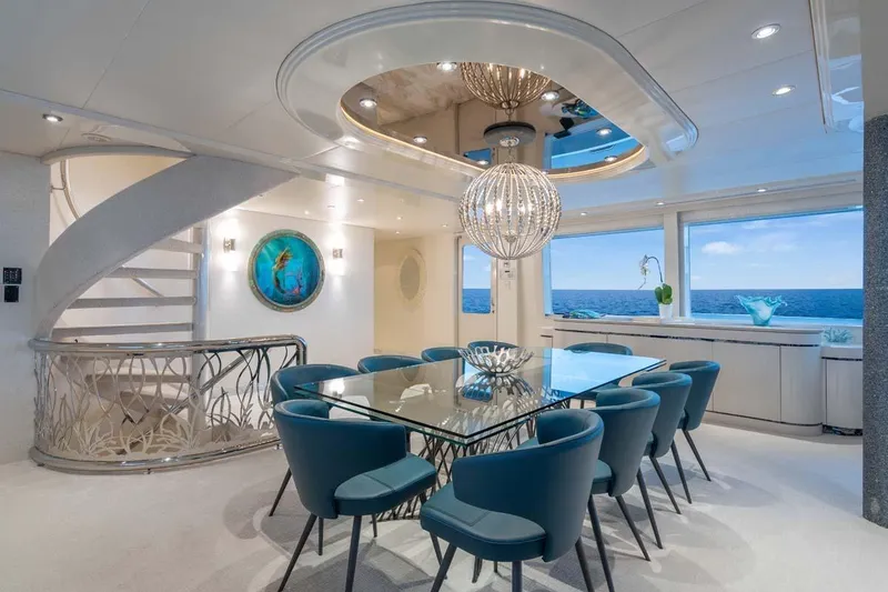 Slide: The Image of Luxurious 2001 Westship Skylounge yacht interior with elegant dining area and ocean view. - 17