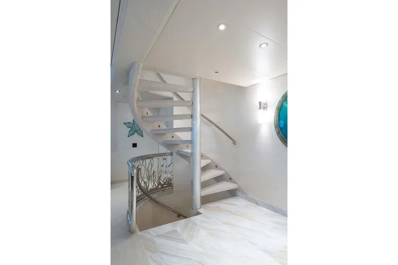 Slide: The Image of Elegant spiral staircase in 2001 Westship Skylounge yacht interior. - 19