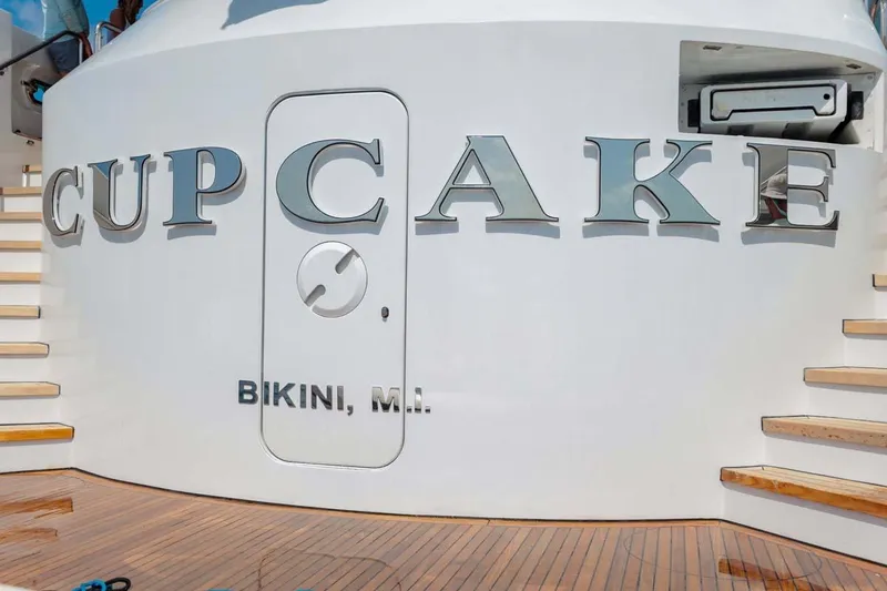 Slide: The Image of 2001 Westship Skylounge yacht "Cupcake" with wooden deck, docked at Bikini, M.I. - 2
