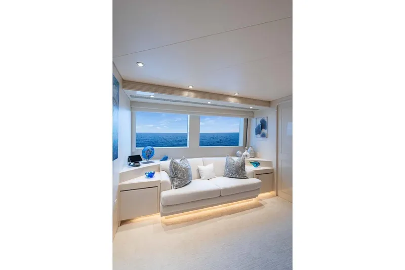 Slide: The Image of Luxurious 2001 Westship Skylounge interior with ocean view, featuring elegant white sofa and decor. - 22