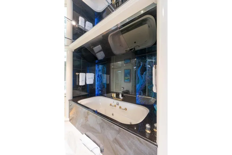 Slide: The Image of Luxurious bathroom in 2001 Westship Skylounge yacht with elegant tub and modern design. - 25