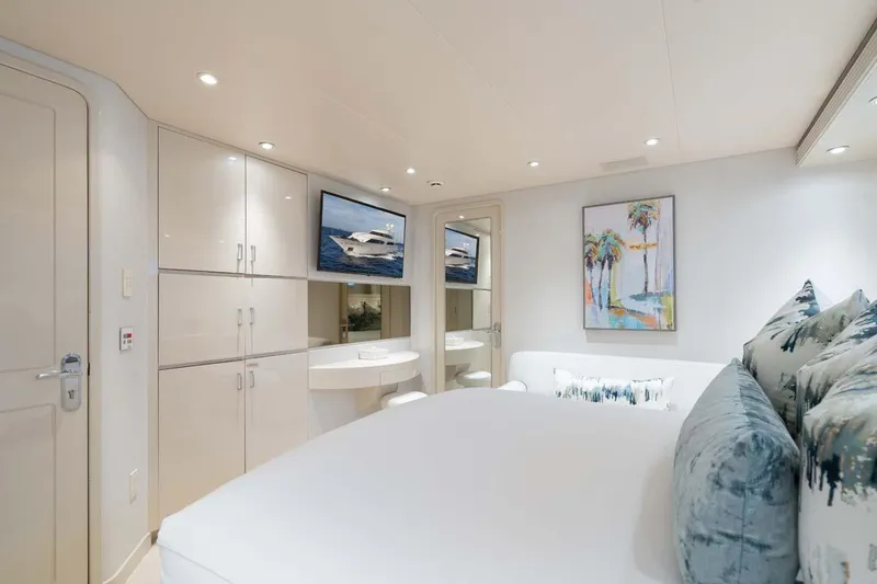 Slide: The Image of Luxurious bedroom interior of 2001 Westship Skylounge yacht with modern decor and artwork. - 30